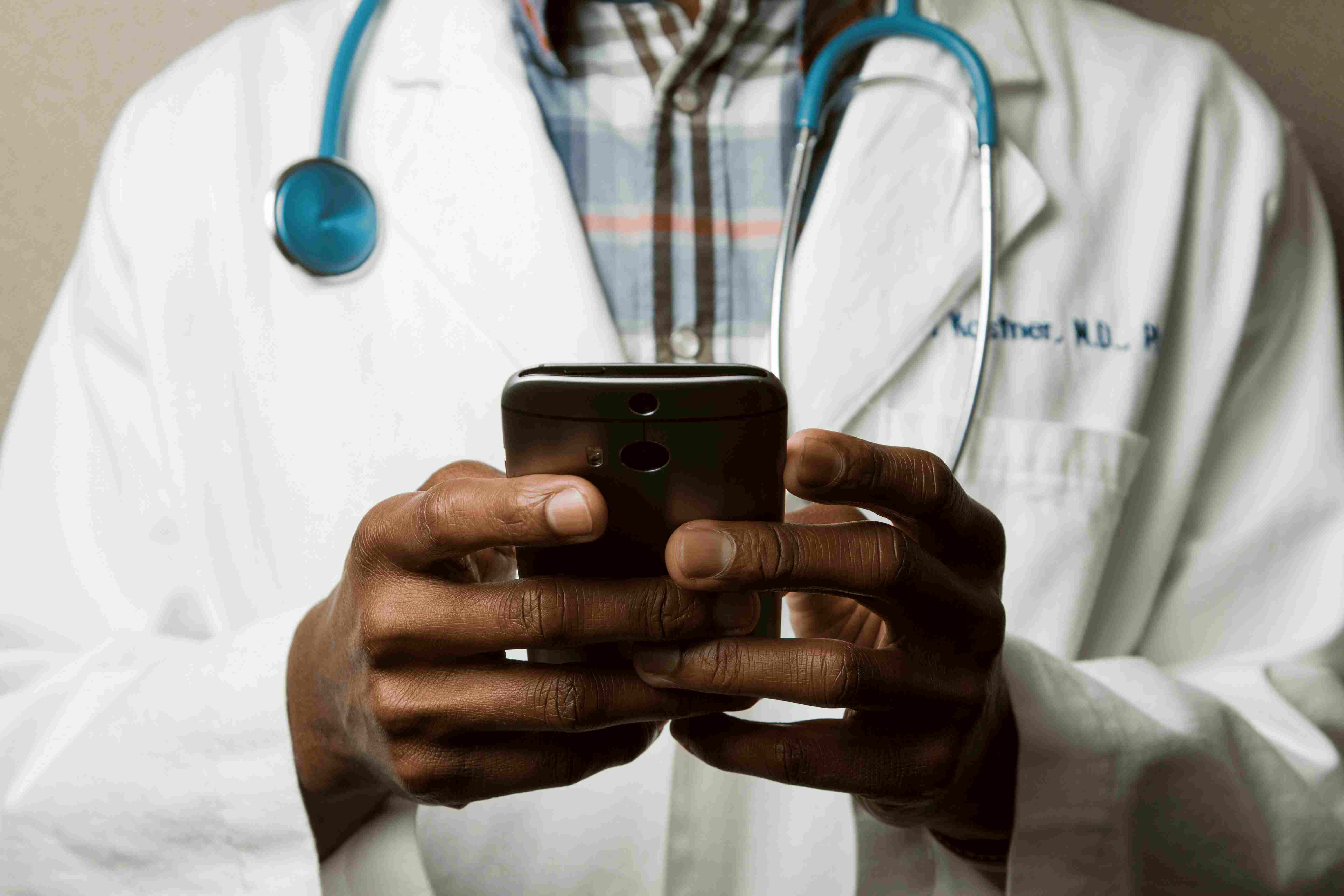 Doctor consulting on a mobile phone